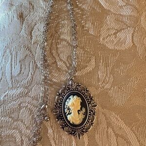 Elegant Silver and Cream Cameo Necklace